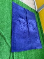 BARELY USED 10BY10 FLUFFY CENTER RUG