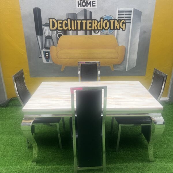 Neatly used 4 seater marble top dinning set