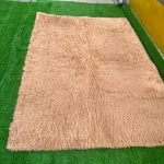 BARELY USED 5 BY 7 FLUFFY FUR RUG (003)