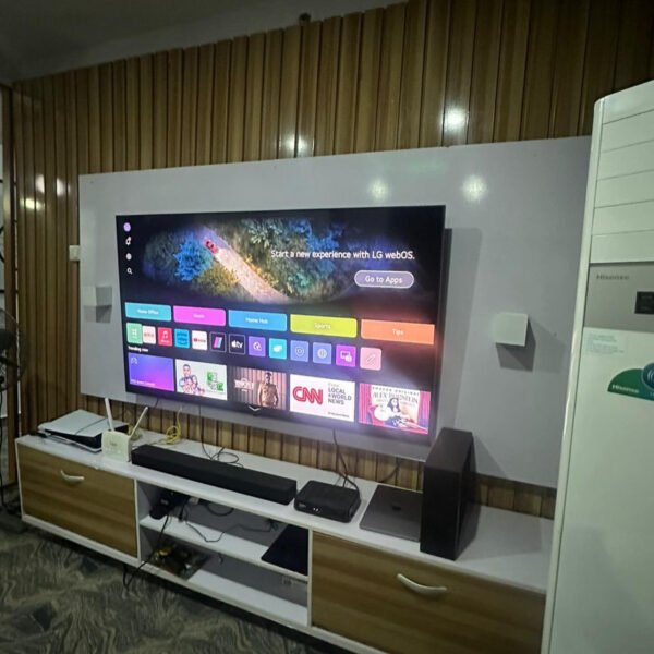 Barely used tv console with wall cladding (size not indicated)