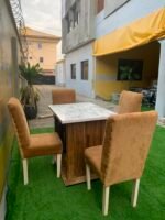 Neatly Used 4 Seater Yellow Dinning Set ( table needs some screws)
