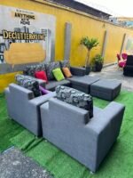 Neatly Used L Shape Sofa With 2 Single Seater, Ottoman And Throw Pillows - Image 9