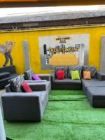 Neatly Used L Shape Sofa With 2 Single Seater, Ottoman And Throw Pillows - Image 11
