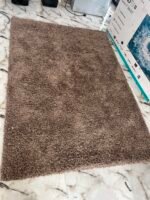 7 BY 10 SHAGGY CENTER RUG (002)