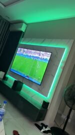 Relatively New Top Quality High Glossy HDF Wood Tv Console With Wall Pannel Cladding And Led Lightning - Image 15