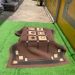 Neatly Used 7by5 Brown Center Rug