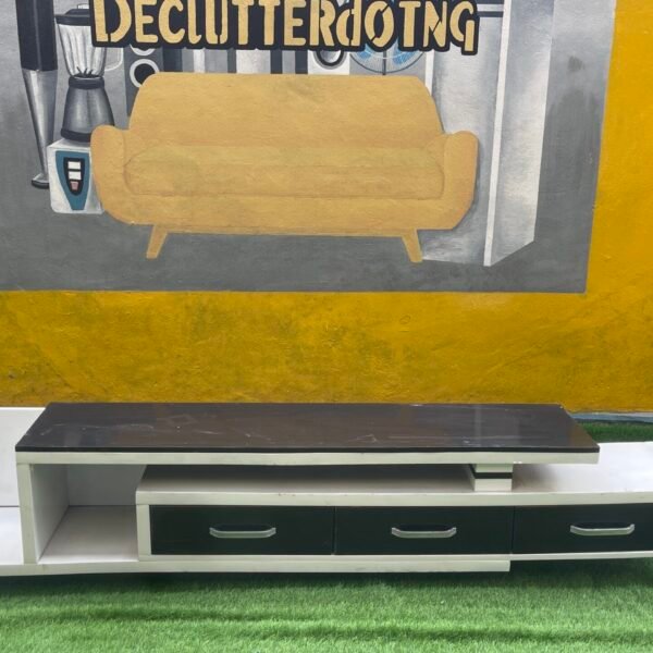 Quality black TV Console Used With some light dents