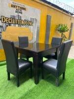 Neatly Used Glass Top Black 4 seater Dinning Set