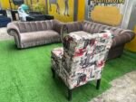 Neatly Used Seven Seater Sofa Set Plus One Masareti Newspaper Accent Chair And Ottoman( Needs Cleaning)