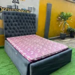 Barely Used 4.5by6 Grey Upholstrey Bedframe With Semi Orthopedic Mattress