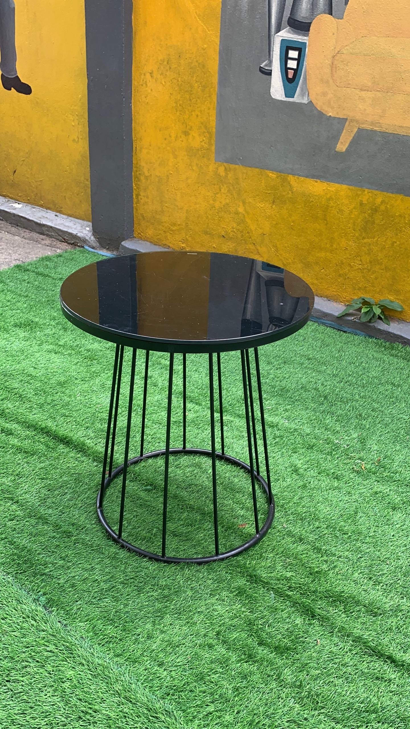 88a13a82-f241-490f-8605-cfcfbc78a5eb Barely Used Top Quality Black Tempered Glass Top Coffe Table With Iron Stand - Image 1