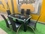 Neatly Used 6 Seater Glass Top Black Dinning Set ( the iron part of the chairs are rusted) - Image 4