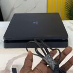 Barely Used Black Sony Play Station 4 Slim Console With Over 6 Games Installed