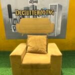 Single Seater Yellow Sofa With Pillow(Needs Washing)