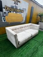 Neatly Used Top Quality 4 Seater Cream Couch With Golden Leg Stand - Image 2