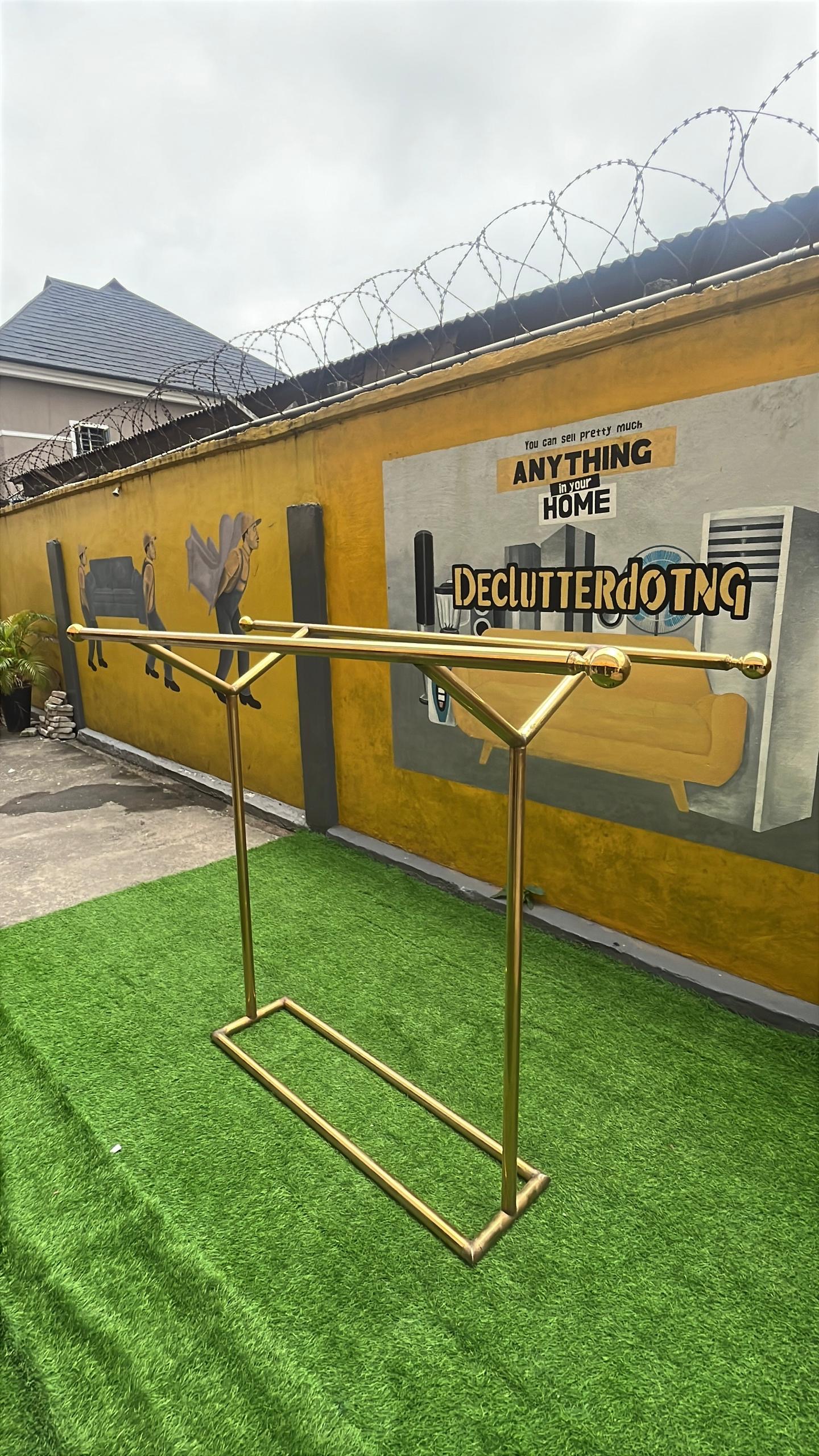 e9c662b8-0a5a-4f09-8d71-22370b00a4bb Barely Used Golden boutique Double Pole Hanger - Image 1