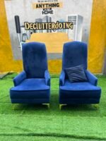 Neatly Used Blue Accent Armless Chair With Pillows