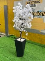 Relatively New White & Green Artificial Flower With Black Plastic Vase - Image 5