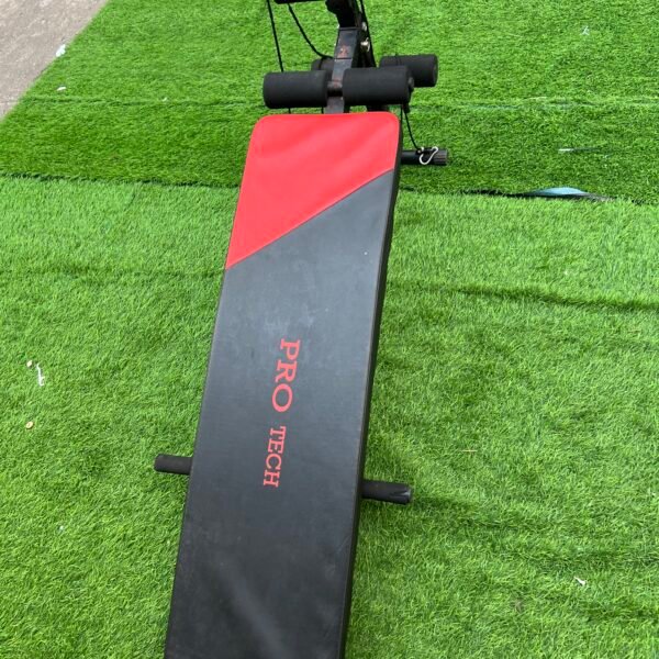 Neatly Used Pro Tech Sit Up Bench With Dumbell