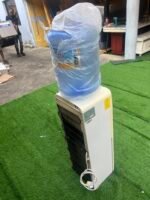 Neatly Used CWAY Water dispenser with storage fridge and bottle - Image 4