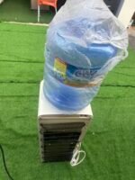 Neatly Used CWAY Water dispenser with storage fridge and bottle - Image 3