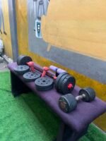 Barely Used 30kg Plastic Adjustable Dumbbell With 10kg and 2 1.5kg And Sit Up - Image 9
